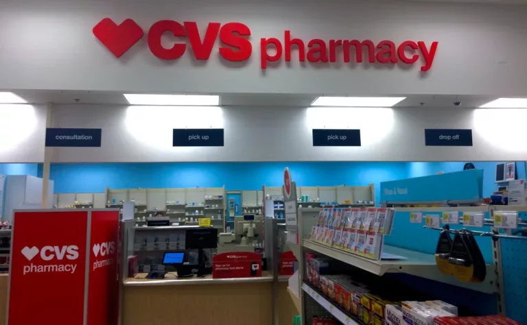 At a CVS store, at the register of the Pharmacy department